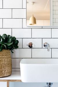 White tiles with black grout.