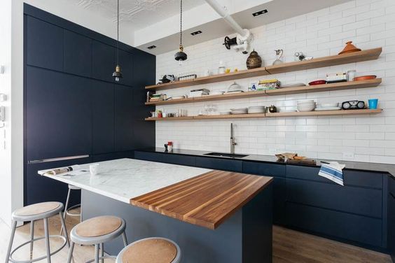 This kitchen is the perfect mix of moody and chic with a dash of industrial. I love the mixing of kitchen counter styles on the island. #ThisOldHouse kitchen inspiration via www.L-2-Design.com