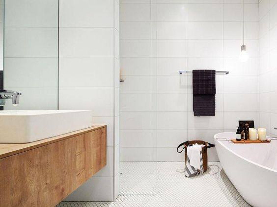 There are a variety of bathroom details in this large-format tile space that are interesting. #ThisOldHouse inspiration via www.L-2-Design.com