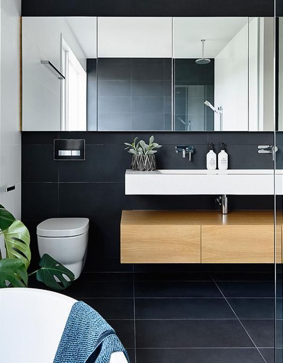 This open space plan has some great bathroom details. The streamlined, mirrored medicine cabinets add light to the dark wall. #ThisOldHouse inspiration via www.L-2-Design.com