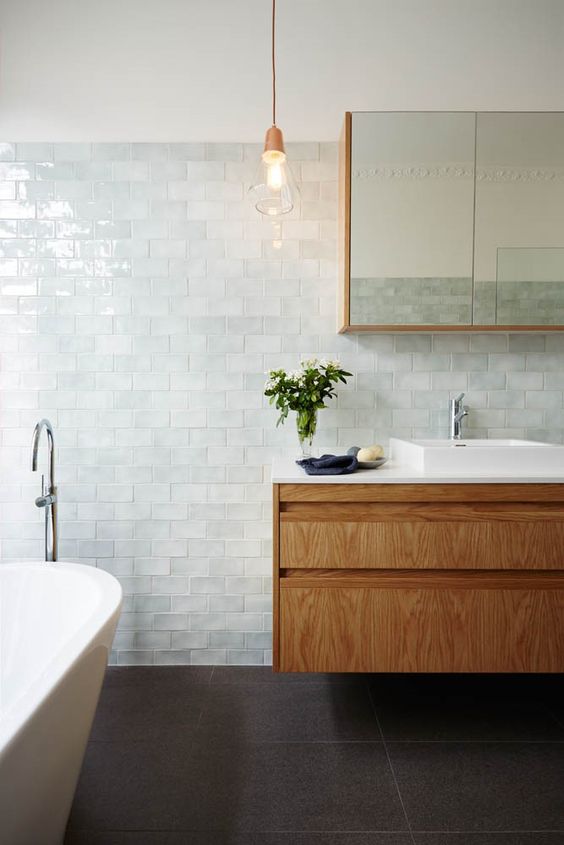 The Australia-based Arkee nailed this bathroom remodel with a simple yet stunning bathroom counter to boot. I love the texture of the wall tile and how it bounces light further into the space. #ThisOldHouse inspiration via www.L-2-Design.com