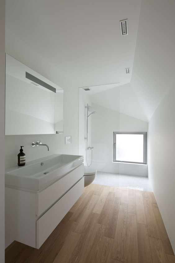 This linear bathroom in Japan has beautifully simple lines and clean transitions. I can only imagine how refreshed you feel preparing for work or bed in this space.