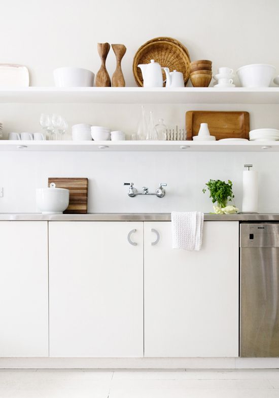 Zooming out a bit to another minimal kitchen and open shelves. The clean horizontal lines and simple color palette are soothing. I bet it's fun to throw a party with those dishes. #ThisOldHouse kitchen inspiration via www.L-2-Design.com