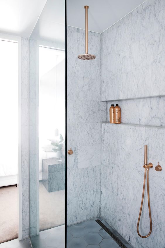 Same thought, new bathroom. Larger hex tile, wall marble. The shower details are similar but unique...and yet just as beautiful. #ThisOldHouse shower inspiration via www.L-2-Design.com