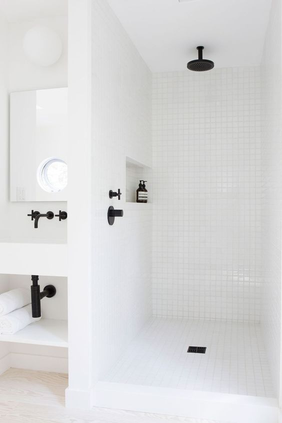 White mosaic in all the places and black hardware to offset it. That's what I call shower details singing in all the right ways. #ThisOldHouse shower inspiration via www.L-2-Design.com
