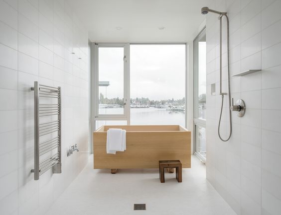 Not necessarily the most efficient, but man - that view! This open tub shower configuration would surely leave everyone in a good mood as the get ready for the day or wind down from a day at work. #ThisOldHouse inspiration via www.L-2-Design.com